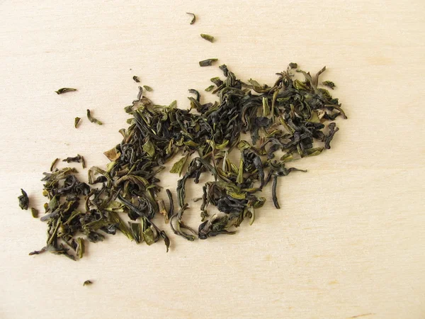Zielona herbata na drewniane tła — Zdjęcie stockowe