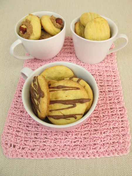 Copos cheios de biscoitos — Fotografia de Stock