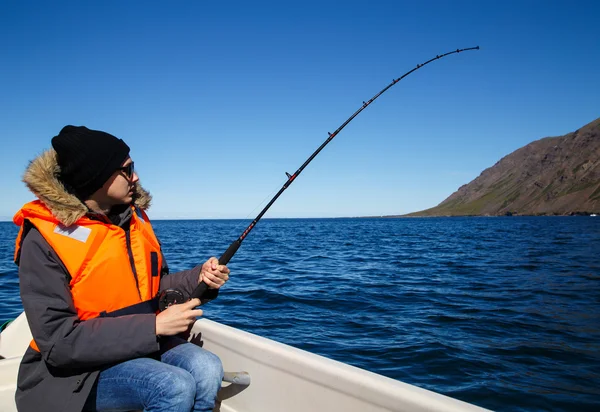 Man fishing on water — Stock Photo, Image