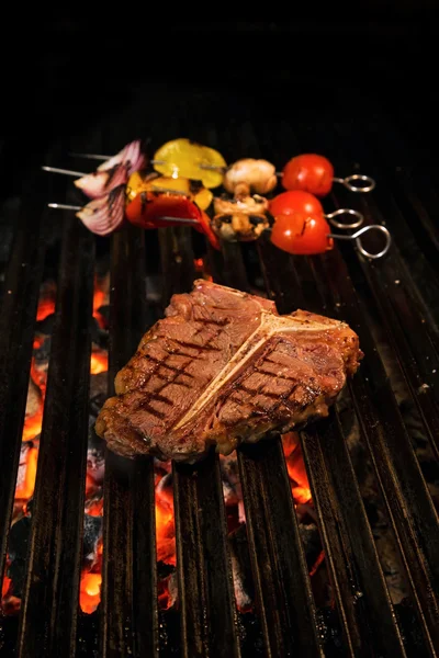 T-Bone steak on the barbecue gril — Stock Photo, Image