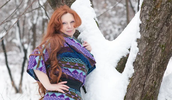 Beautiful adult woman in winter — Stock Photo, Image