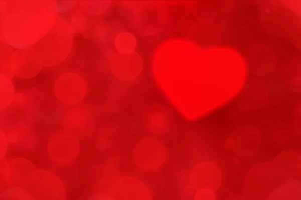 Серце на червоному тлі — стокове фото