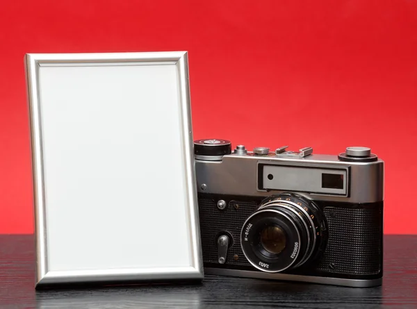 Vintage camera and photo — Stock Photo, Image