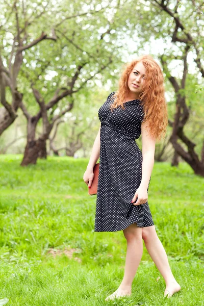 Woman on the grass — Stock Photo, Image