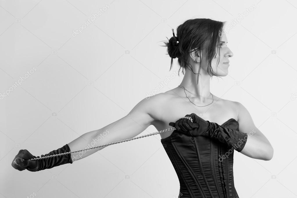 Woman in a corset and  chain