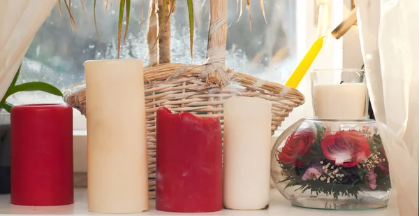 Candles on a windowsill — Stock Photo, Image