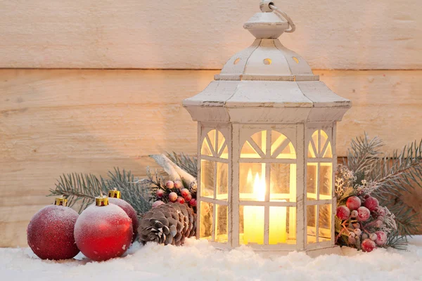 Candle lantern in snow — Stock Photo, Image