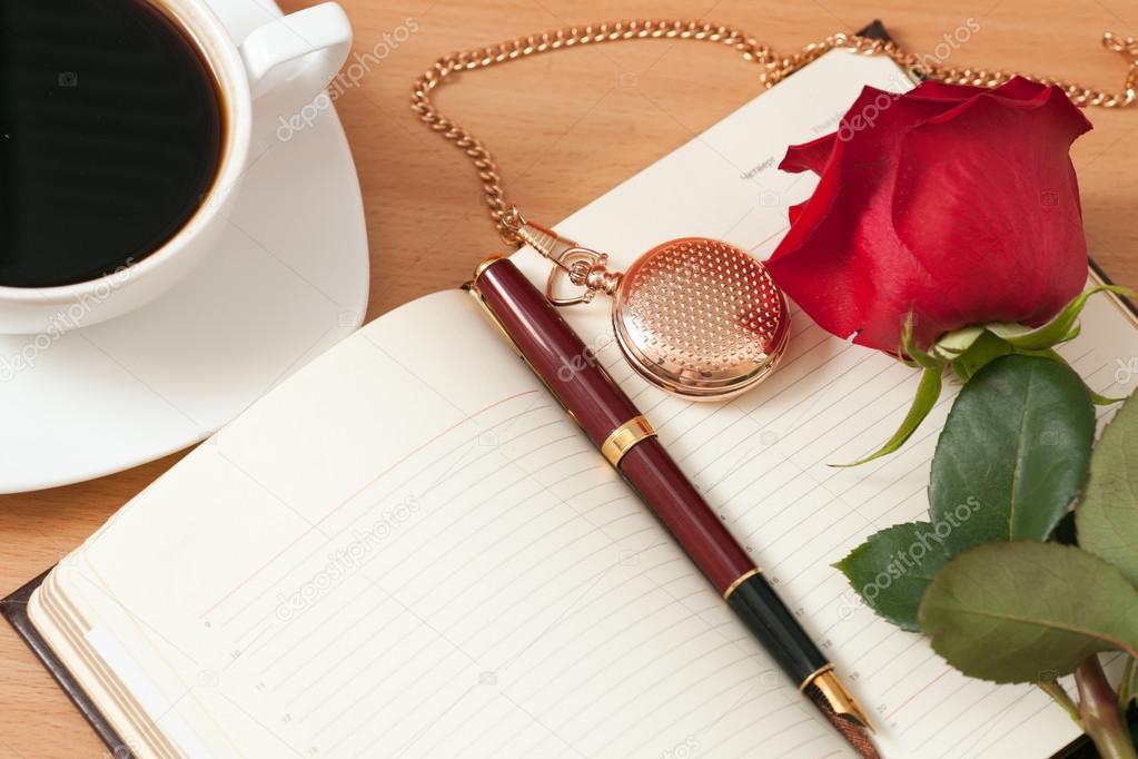Notebook and rose