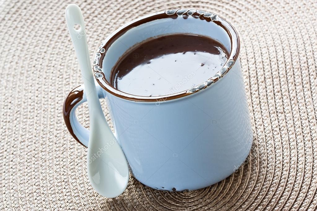 Hot chocolate in blue rustic mug