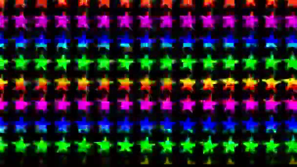 Gradiente de arco iris proyectado sobre filas de estrellas giratorias — Vídeos de Stock