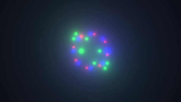 Trois anneaux rouges verts et bleus formés à partir de points uniques de lumière — Video