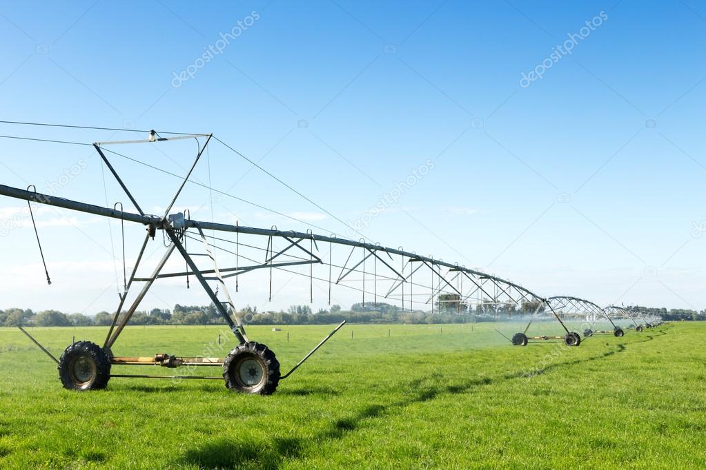 spray water machine in grassland