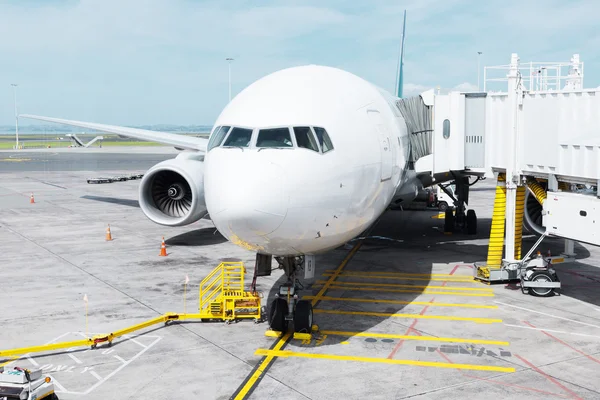 Big white airplane in airport — Stock Photo, Image