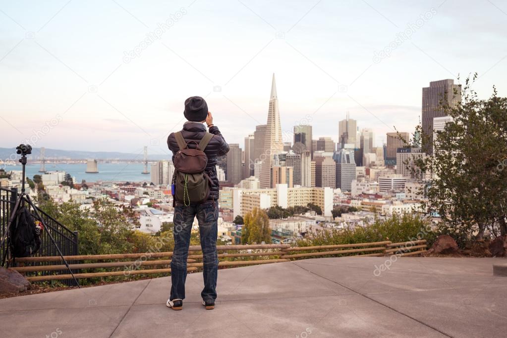 man photographer on marble floor near San Francisco
