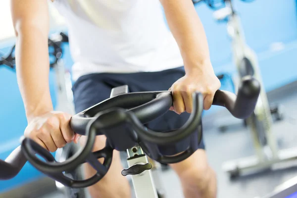Man working out in modern gym — Stock Photo, Image