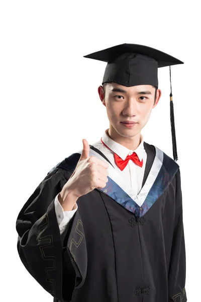 Asian young man in education gown — Stock Photo, Image