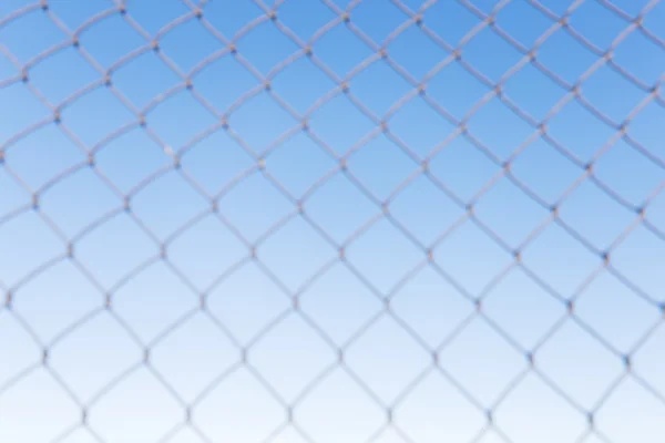 Steel net with blue sky background — Stock Photo, Image