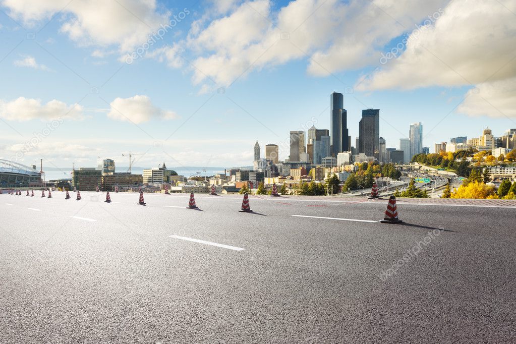 road with cityscape and skyline of Seattle