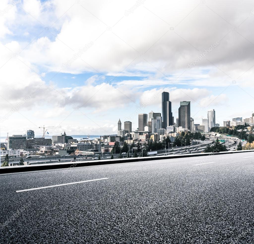 city road with cityscape and skyline of Seattle
