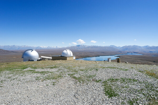 observatory on ground near lake in New Zealand