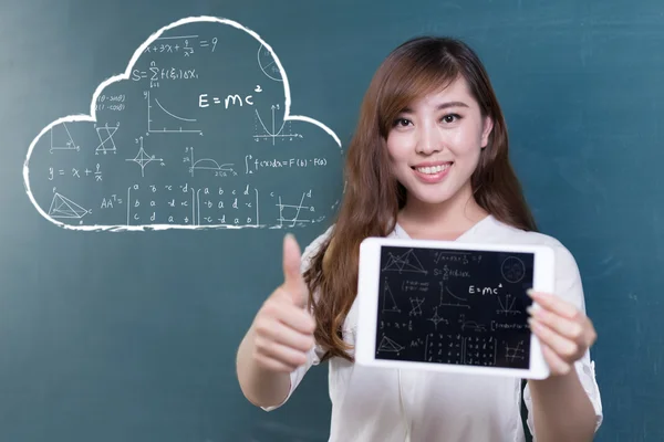 Asian girl teacher with tablet and blackboard — Stock Photo, Image