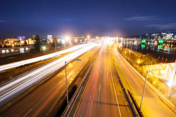 Busy traffic on road at night in Portland — Stock Photo, Image
