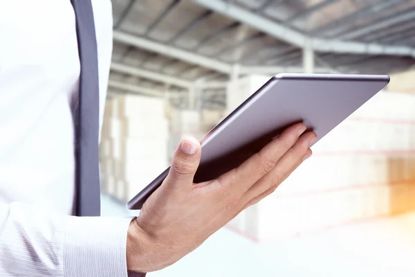 Double exposure of businessman with tablet — Stock Photo, Image