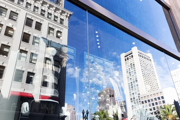 Double exposure of manequins and buildings in San Francisco — Stock Photo, Image