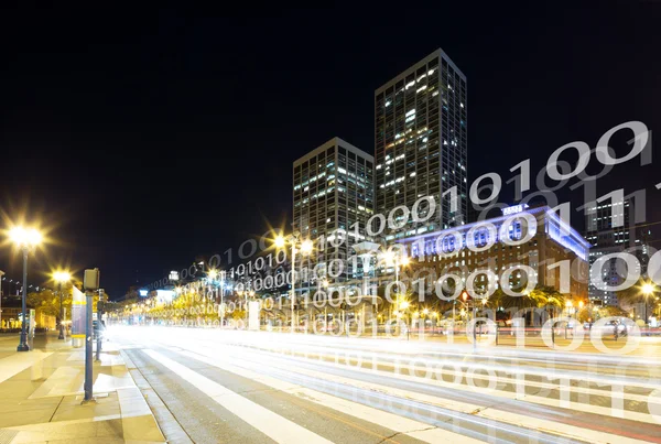 traffic on road in downtown of San Francisco at night