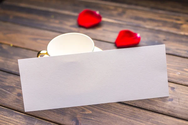 White blank card on table in cafe — Stock Photo, Image