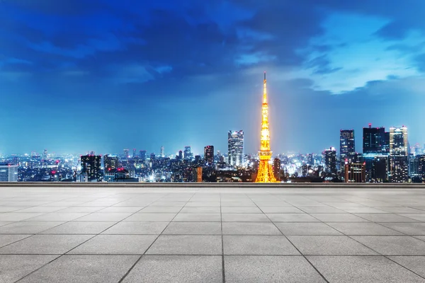 empty street with cityscape and skyline of Tokyo