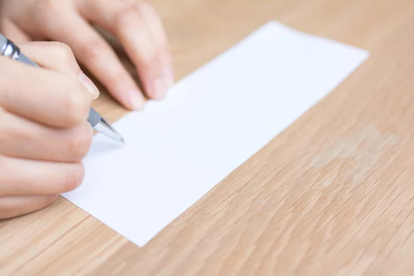 Uomo d'affari che scrive sul Libro bianco — Foto Stock