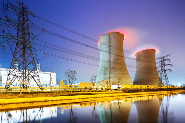 Buildings of modern power station near river — Stock Photo, Image