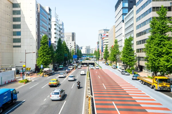 Difuminación del tráfico por carretera en el centro de Tokio —  Fotos de Stock