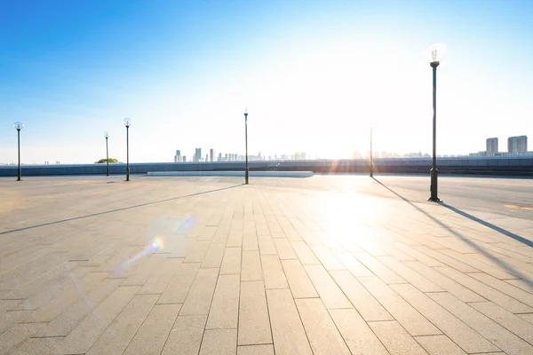 Lege stadsplein in Harbin met sunbeam — Stockfoto