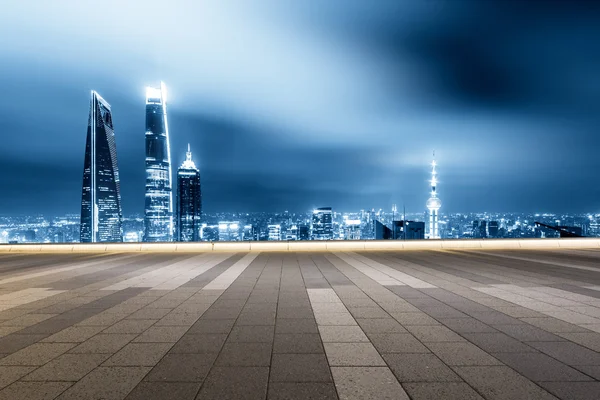 Cityscape and skyline of Shanghai from brick floor — Stock Photo, Image