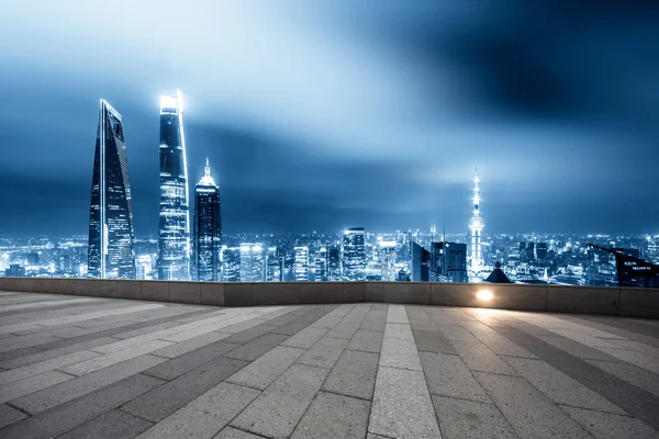 Cityscape and skyline of Shanghai from brick floor — Stock Photo, Image