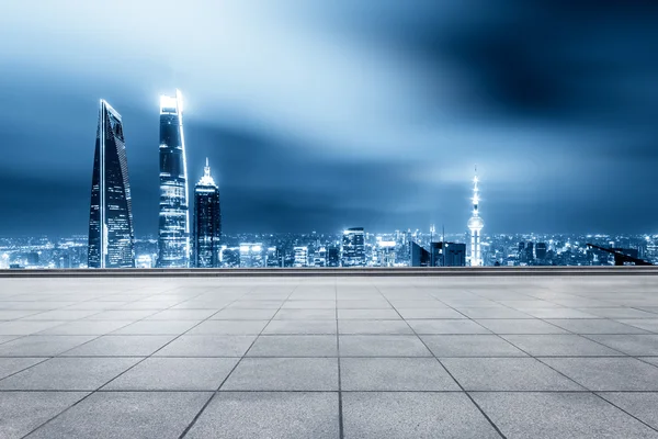 Cityscape and skyline of Shanghai from brick floor — Stock Photo, Image