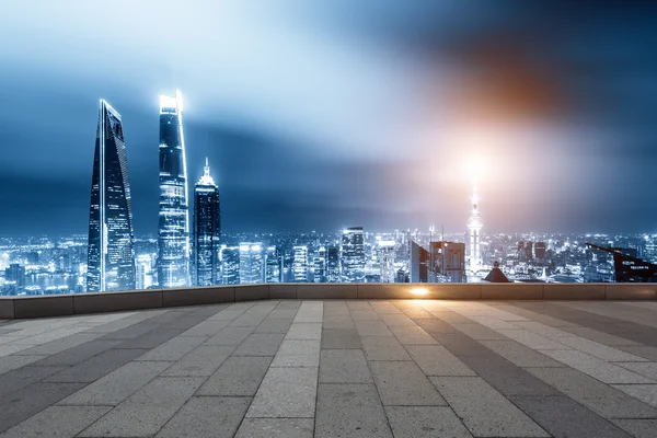 Cityscape and skyline of Shanghai from brick floor — Stock Photo, Image