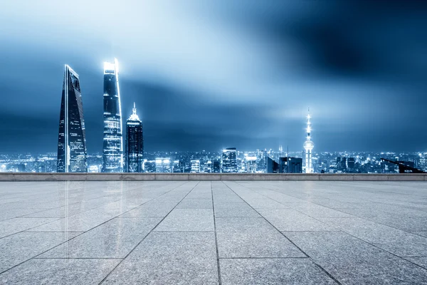 Cityscape and skyline of Shanghai from brick floor — Stock Photo, Image