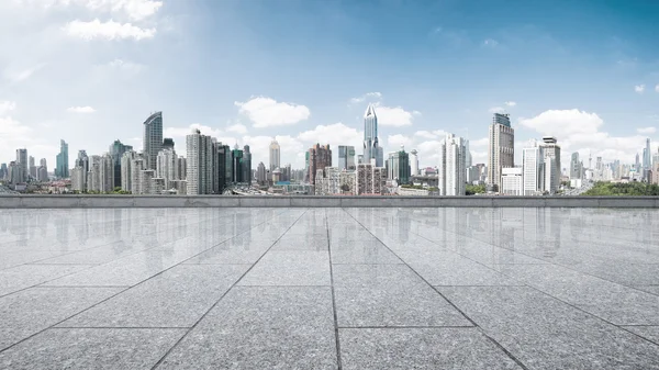 Cityscape and skyline of Shanghai from brick floor — Stock Photo, Image