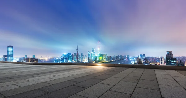 Cityscape and skyline of Shanghai from brick floor — Stock Photo, Image