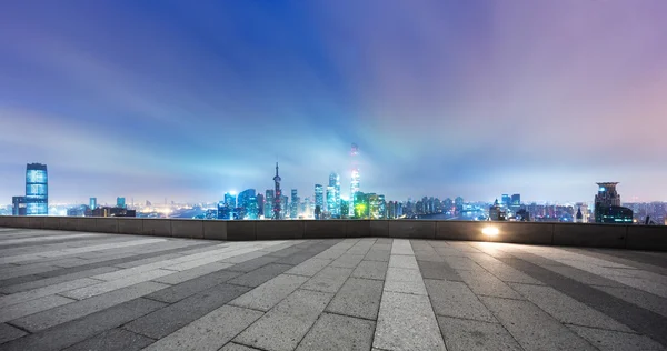 Cityscape and skyline of Shanghai from brick floor — Stock Photo, Image