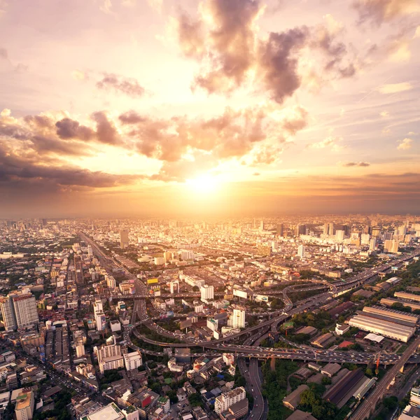 Bird view of urban cityscape at sunset — Stock Photo, Image