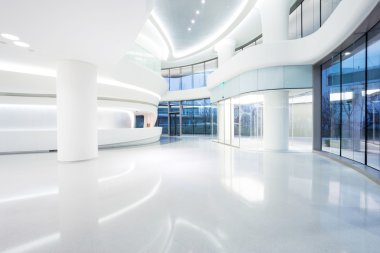 Futuristic modern office building interior clipart