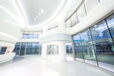 Futuristic modern office building interior clipart