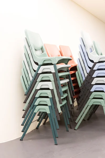 Colorful stack of chairs — Stock Photo, Image