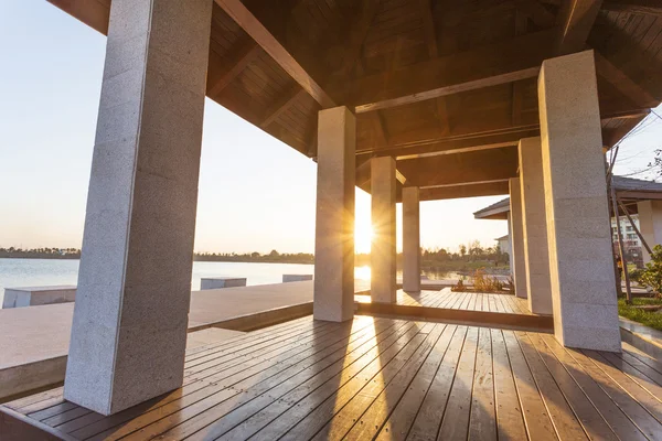 Resort lakeside pavilion at sunset — Stock Photo, Image