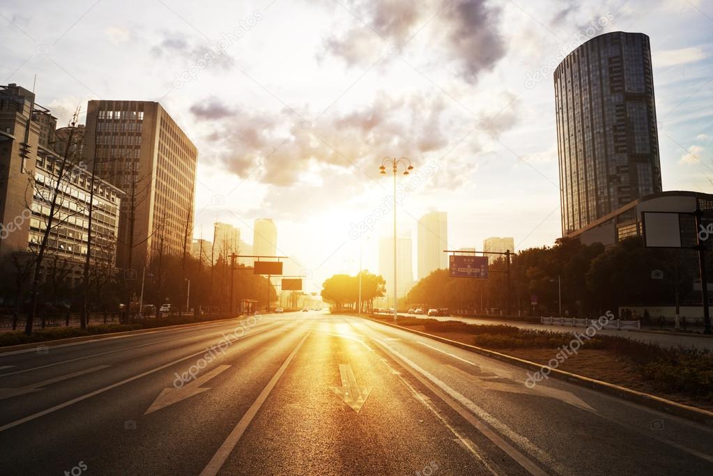 modern city road scene at sunset