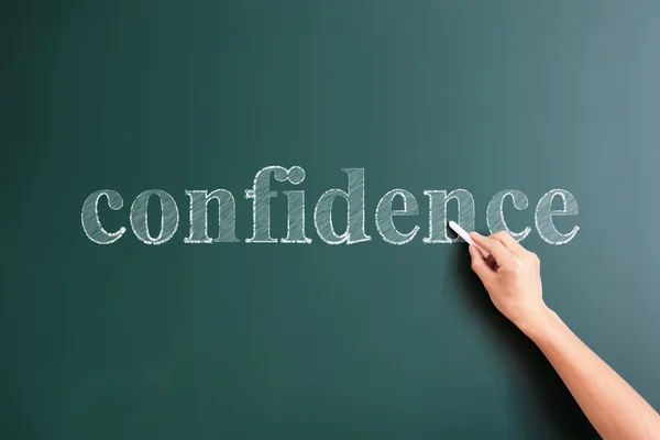 Confidence written on blackboard — Stock Photo, Image